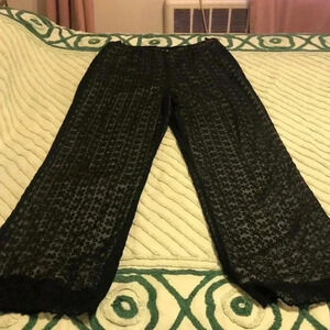 Odille Anthropologie lace floral lined pants.